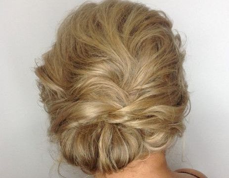 22 Messy asymmetric low chignon